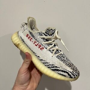 Adidas White and Black Sneakers with Boost Technology